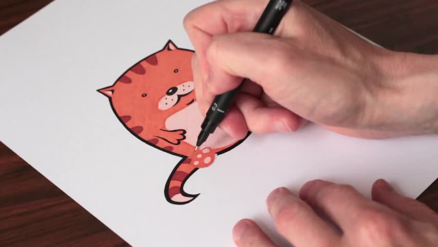 An artist draws a cartoon cat on a piece of paper. Close-up of hands. A lesson in an art studio. Hobbies: art and drawing. Creative work with liners and markers. Video footage