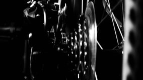 High contrast Bicycle gears and wheel spin black and white