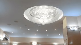 Elegant crystal chandelier illuminating a luxurious ballroom - Powered by Shutterstock - Get 15% off with code: PIKWIZARD15