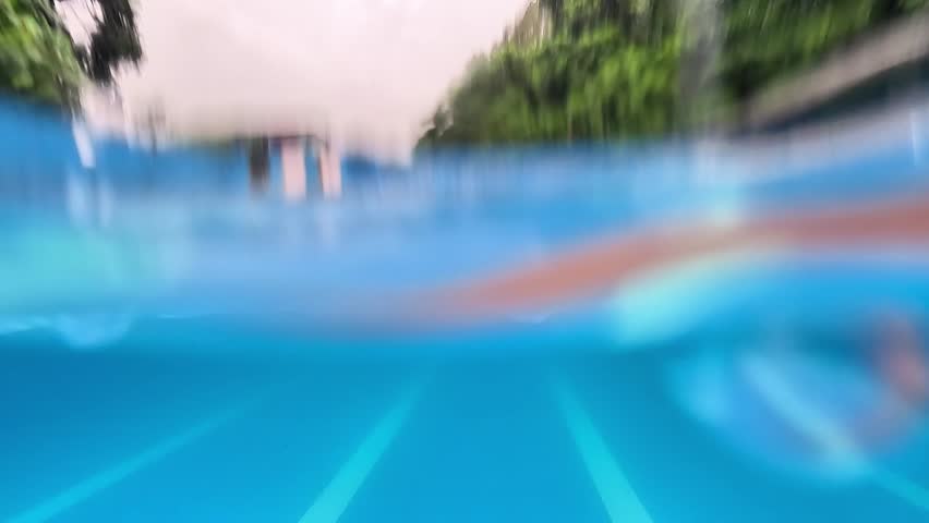 Raindrops falling in the swimming pool. Clean swimming pool.