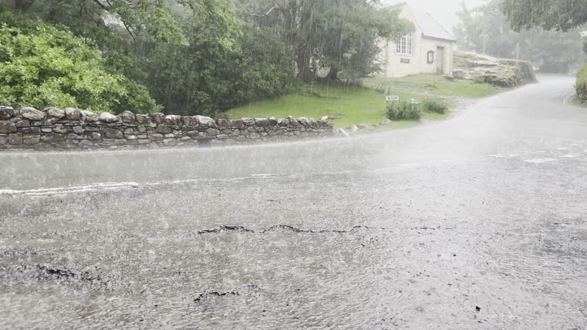 Rain falling on a road