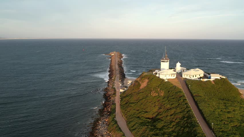 Newcastle NSW Australia Historic Coastal Nobbys Lighthouse Surrounded by Scenic Beaches and Ocean Views