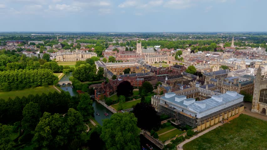 Panoramic view of Cambridge University, showcasing its historic colleges, the river Cam, and lush green spaces in Cambridge, UK