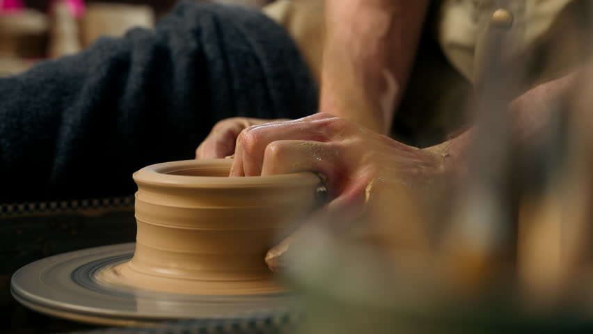 Man hands sculpting clay modeling professional male master potter pottery creating formed vase jug pot craftsman art handmade artisan skill craft earthenware ceramic product workshop clayware artwork