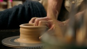 Man hands sculpting clay modeling professional male master potter pottery creating formed vase jug pot craftsman art handmade artisan skill craft earthenware ceramic product workshop clayware artwork - Powered by Shutterstock - Get 15% off with code: PIKWIZARD15
