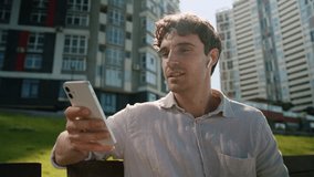 Caucasian man listen music headphones enjoy sound businessman male guy city listening song earphones smartphone online audio app mobile phone addict urban student relaxing business mp3 outdoor device - Powered by Shutterstock - Get 15% off with code: PIKWIZARD15