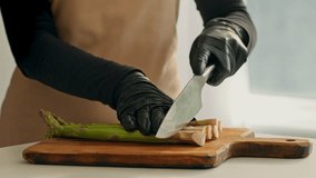Chef preparing fresh asparagus in an eco-friendly kitchen setting - Powered by Shutterstock - Get 15% off with code: PIKWIZARD15
