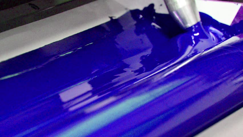 Cyan, Blue  on the offset  print press machine  closeup