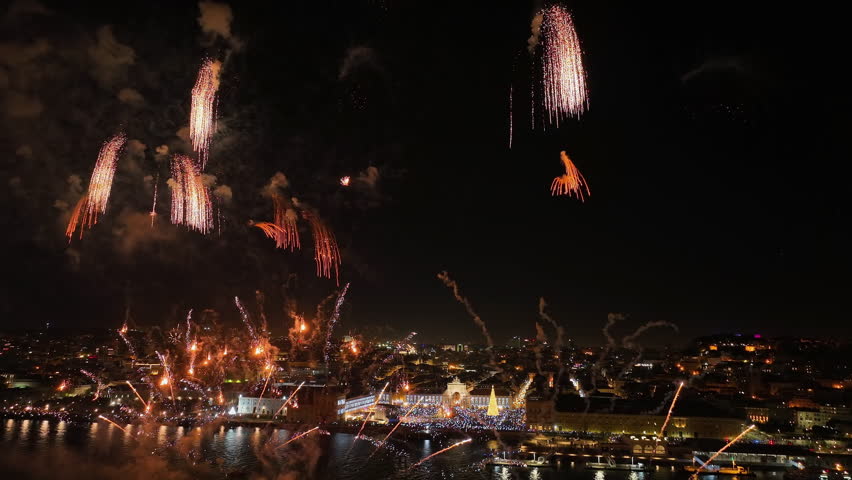 Aerial view of New Years eve fireworks and the Lisbon city skyline in Portugal