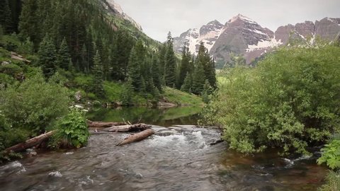 (1288) Fishing Creek Aspen Maroon Bells Lake Rocky Mountains LOOP. Themes of summer tourism, adventure, getaways, meditation, travel, wilderness, exploration, nature, mountains. See my portfolio.