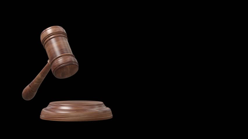 Court or auction gavel striking a wooden base - 3D rendering video on transparent background