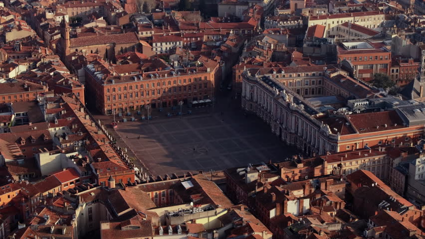 Place du Capitole in Toulouse, France, featuring the Capitole building and surrounding cityscape of the main city square