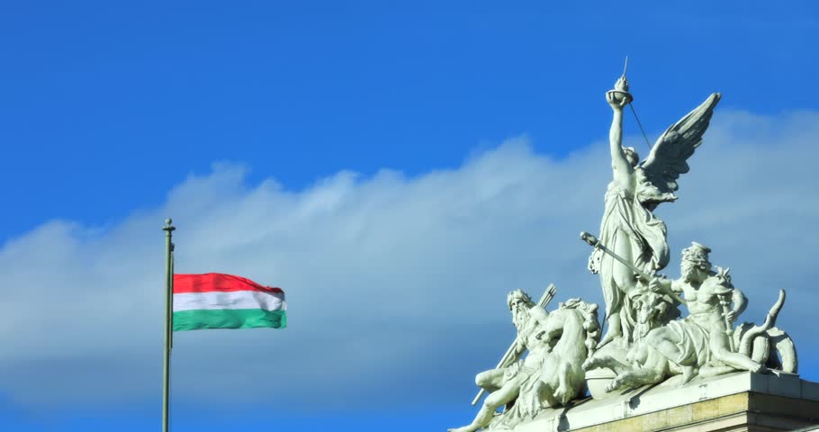 Budapest, Hungary - May 29 2025: Flag on the top of the Budapest Keleti station, the main international and inter-city railway terminal in Budapest, Hungary. 