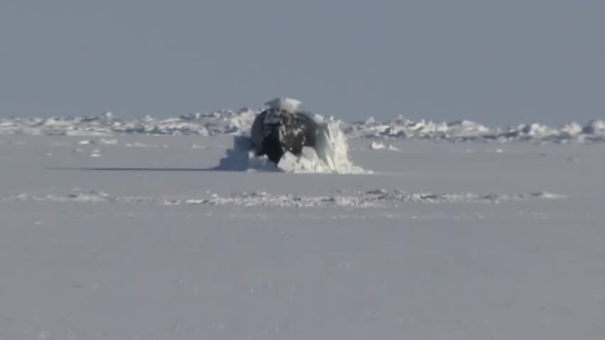 Royal Navy Submarine HMS Trenchant Breaks Through Arctic Ice at North Pole