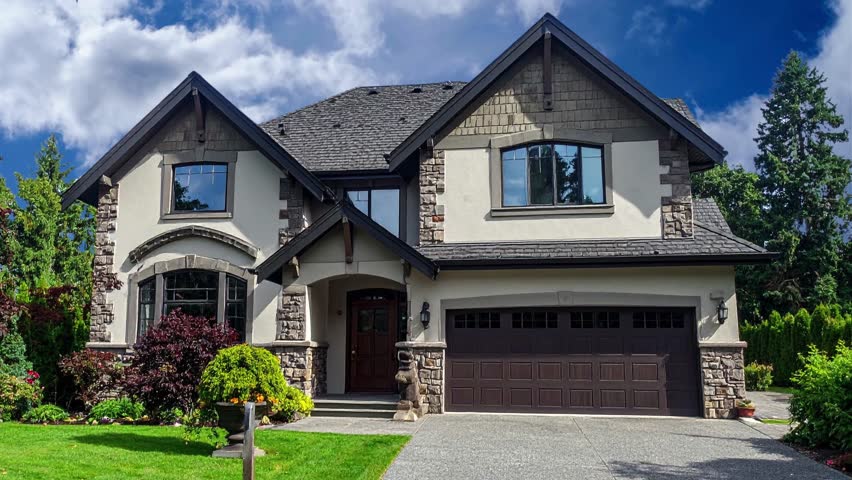 Modern stone facing and siding tow story family house with 04 Bedroom and Garage