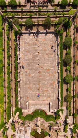 Drone video of the terraced gardens of Isola Bella, Lake Maggiore, Italy. Baroque landscaping with exotic plants, statues, and lake views unfolds across elegant levels in the Borromean Gulf
