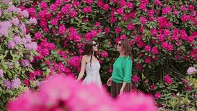 Magical garden giant rhododendron bushes and mother and daughter bonding moment - Powered by Shutterstock - Get 15% off with code: PIKWIZARD15
