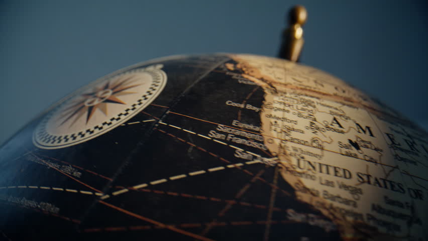 Closeup globe showing North America geography in educational space. Detailed map object rotating indoors for travel knowledge. Vintage Earth illustration symbolizing navigation and learning activity.