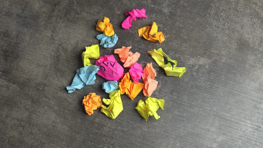 A colorful collection of crumpled sticky notes