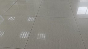 Light is reflecting on shiny floor tiles. - Powered by Shutterstock - Get 15% off with code: PIKWIZARD15