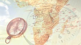 Analog clock face starting fading over map of Africa as compass needle pointing NW marking time. Vintage, navigation, exploration, geography, heritage, travel, technology - Powered by Shutterstock - Get 15% off with code: PIKWIZARD15