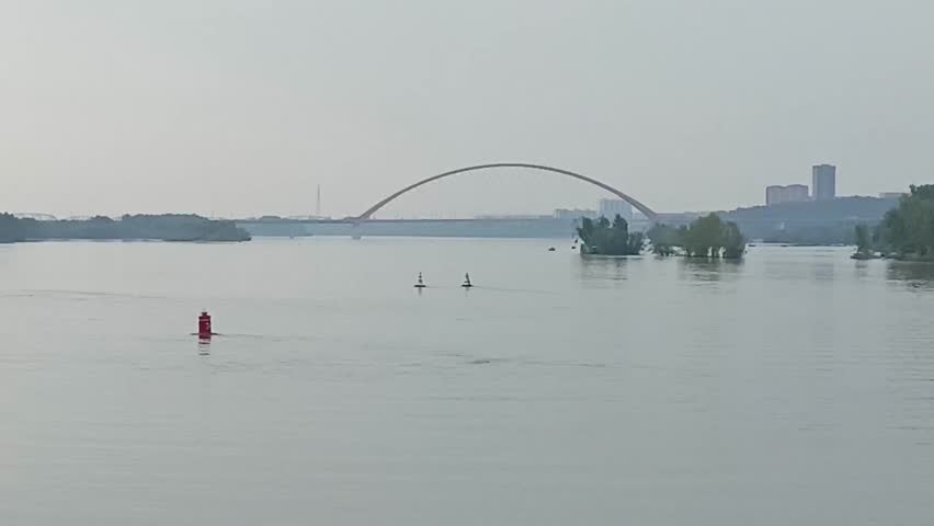 River bed with navigational conditions is crossed by a pleasure boat on a sunny summer morning, Time Lapse.