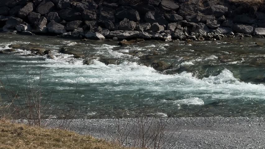 River water stream flow of mountain creek outdoor nature Switzerland Europe