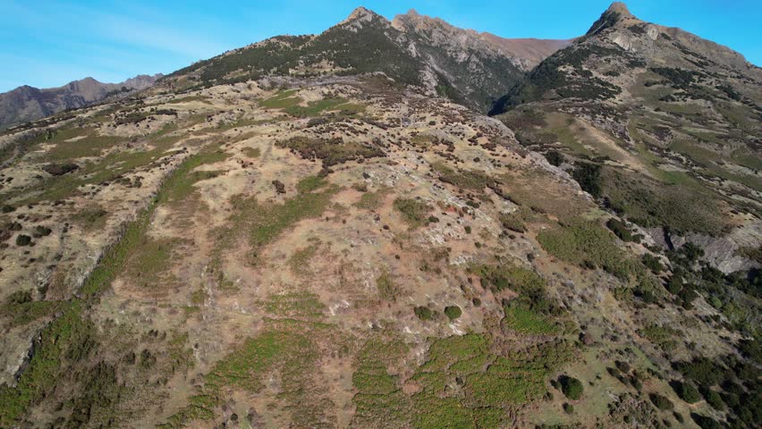 Mount Burke And Lake Hawea At Daytime In South Island, New Zealand - Aerial Pullback