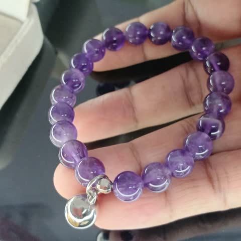 Classic and Elegant Purple Amethyst Necklace on a Black Background