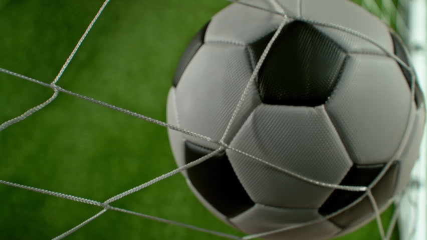 Super Slow Motion Soccer Ball Hitting Goal Net on Green Field, 1000fps.