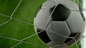 Super Slow Motion Soccer Ball Hitting Goal Net on Green Field, 1000fps. - Powered by Shutterstock - Get 15% off with code: PIKWIZARD15