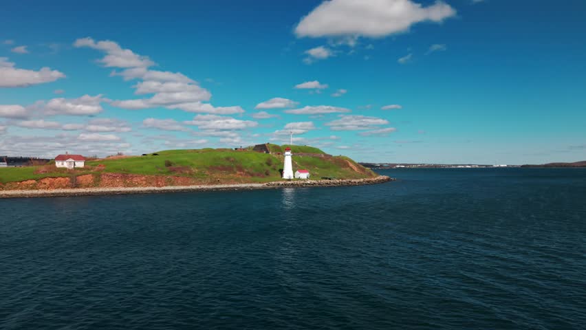 Aerial views capturing Georges Island Lighthouse and its surrounding coastal landscape.