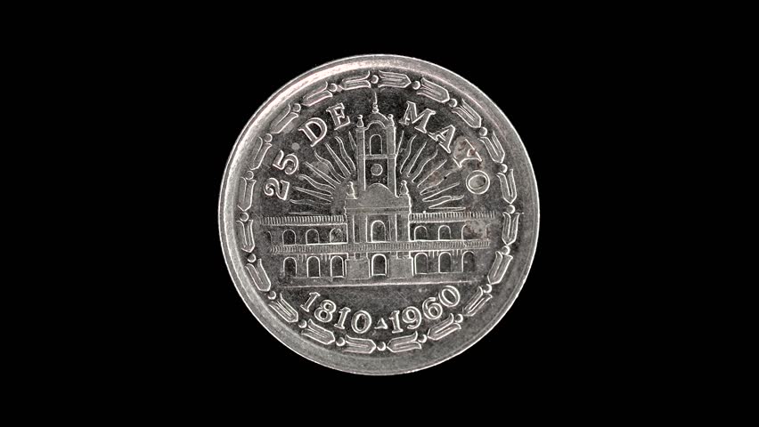 Argentina 1960 1 peso coin reverse with Cabildo building rotating on black background