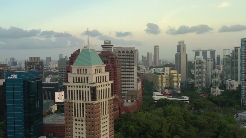 sunset evening singapore city center downtown aerial panorama 4k