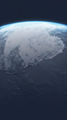 Vertical Video of Antarctica from Space with Clouds Below and Thin Blue Atmosphere. Earth from Above Showing Fragility of Life and Massive South Pole Ice Continent. Science Footage.