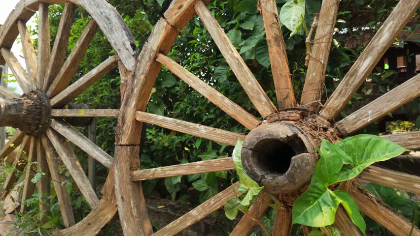 Old Wooden Cart Wheels Used as Rustic Decor