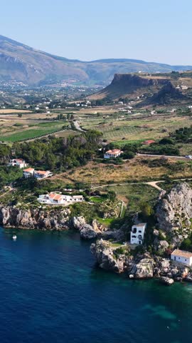 The sea of ​​Sicily, Italy. Tonnara di Scopello. 4K
Aerial view of the most beautiful coast of Sicily. The bay of Scopello, between Palermo and San Vito Lo Capo. Riserva dello Zingaro.