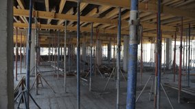 Concrete floor under construction with formwork and support props - Powered by Shutterstock - Get 15% off with code: PIKWIZARD15