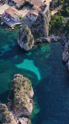 The sea of ​​Sicily, Italy. Tonnara di Scopello. 4K
Aerial view of the most beautiful coast of Sicily. The bay of Scopello, between Palermo and San Vito Lo Capo. Riserva dello Zingaro.