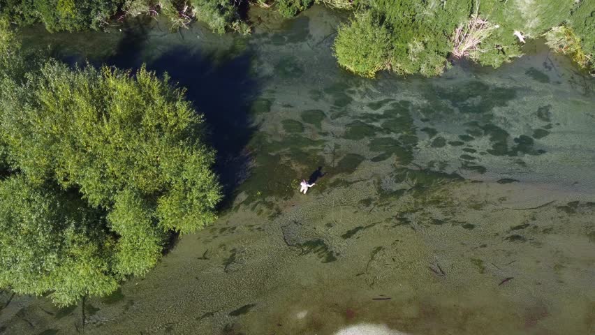 Aerial View of Fly Fishing in a Remote River