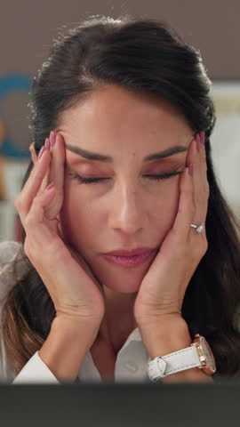 Tired, entrepreneur and woman with headache, office and stress for deadline of project or corporate. Contemplating, mature person and migraine for financial pressure of company, anxious and burnout