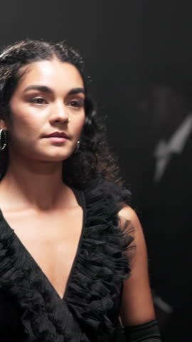Catwalk, creative and fashion show with models in studio for launch or premiere of clothes brand. Designer outfit, event and walking on runway with people at showcase for clothing line presentation