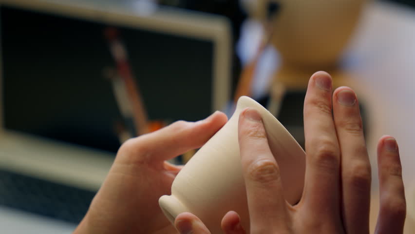 Pottery dishware modeling sculpting clay handmade cup man hands potter male guy craftsman artisan sculptor artist process ceramics hobby craft design sculpture crockery porcelain handcraft art work