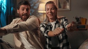 Funny Caucasian couple happy family husband wife girl guy dancing together on sofa couch have fun carefree woman man spouses dance move celebrate moving day holiday evening night relax at home party - Powered by Shutterstock - Get 15% off with code: PIKWIZARD15