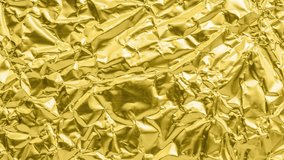 Luxury shiny metallic golden foil crumpled texture background stop motion - Powered by Shutterstock - Get 15% off with code: PIKWIZARD15