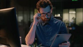 Caucasian middle-aged businessman stock market trader business man broker computer trading analyst CEO manager in night evening office professional employer in glasses tired overtime working overwork - Powered by Shutterstock - Get 15% off with code: PIKWIZARD15