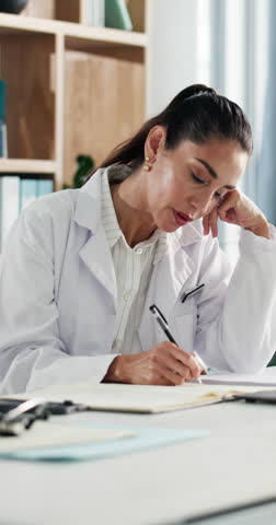 Research, woman or doctor writing in notebook for schedule, planning report and healthcare. Studying, learning or surgeon with diary for reading online information, medical aid or clinical reference