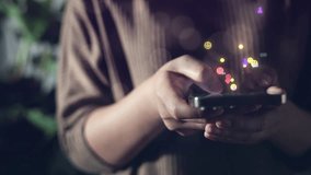 Close-up of hands holding smartphone with floating social media icons, symbolizing digital interaction, real-time communication, and online user engagement for modern technology and lifestyle themes. - Powered by Shutterstock - Get 15% off with code: PIKWIZARD15