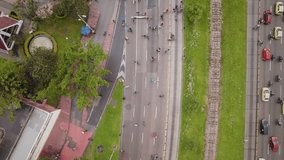 Man Holding Colombian Flag During Protest on Street – Bogotá, Colombia - Powered by Shutterstock - Get 15% off with code: PIKWIZARD15