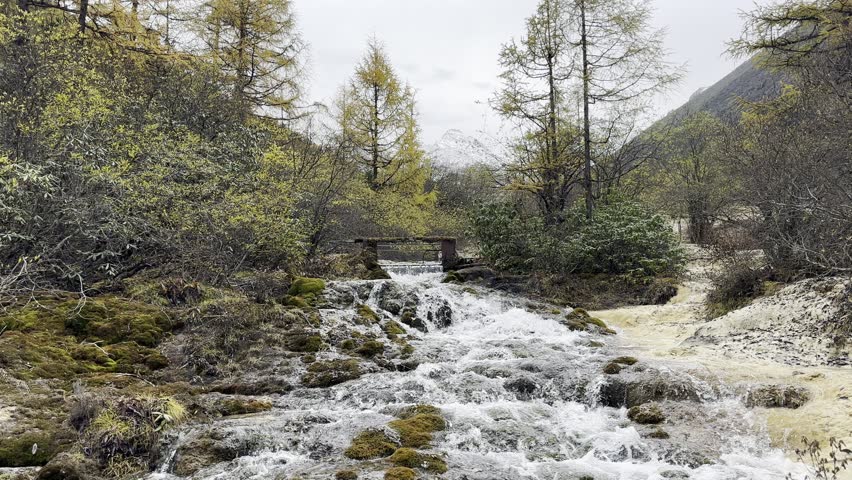 Huanglong Mountain with beautiful nature calcification pool ,waterfalls,lake in China